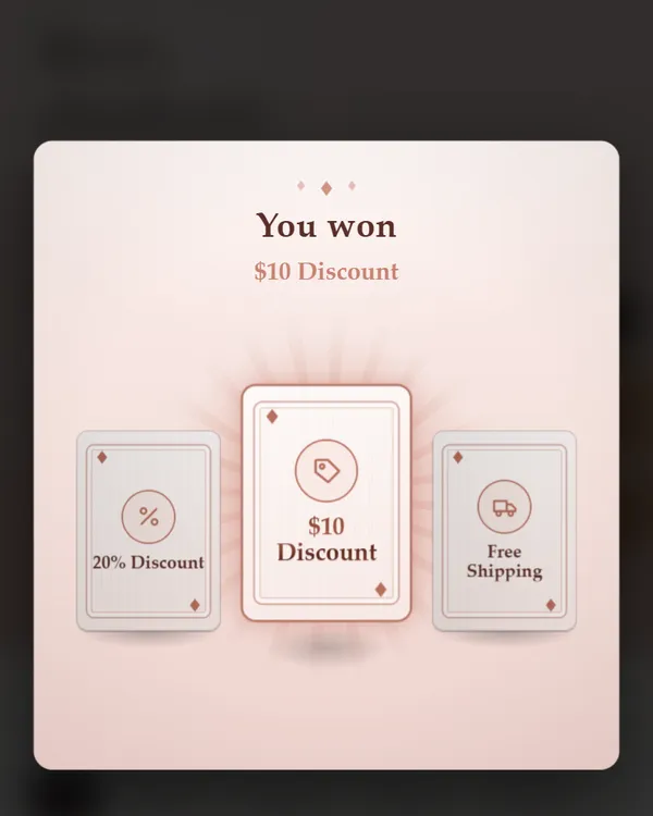 Three blush cards with the middle one turned over to show “$10 Discount” under “You won”.